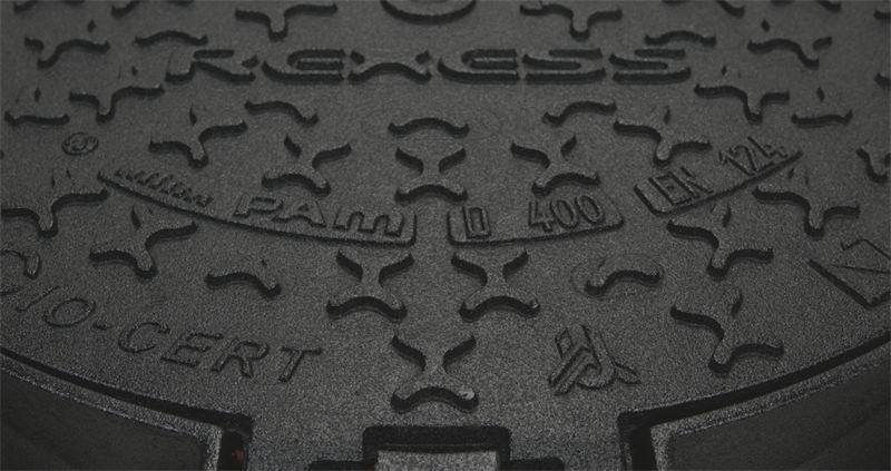 Detail of a REXESS ductile iron cover surface